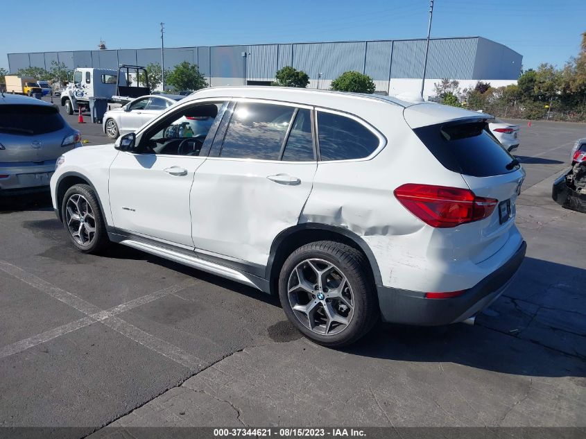 Photo 2 VIN: WBXHU7C37H5H33317 - BMW X1 