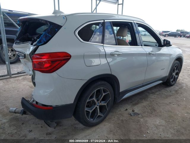 Photo 3 VIN: WBXHU7C37J5H40239 - BMW X1 