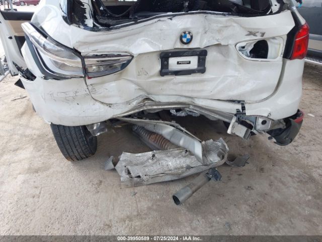 Photo 5 VIN: WBXHU7C37J5H40239 - BMW X1 