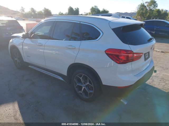 Photo 2 VIN: WBXHU7C37J5H40404 - BMW X1 