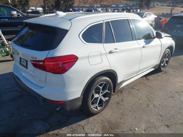 Photo 3 VIN: WBXHU7C37J5H40404 - BMW X1 