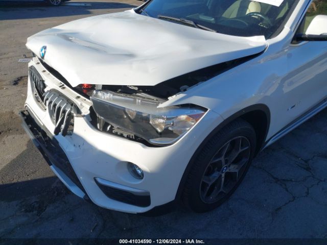 Photo 5 VIN: WBXHU7C37J5H40404 - BMW X1 