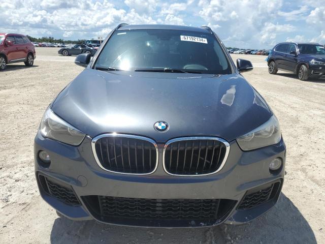 Photo 4 VIN: WBXHU7C37J5H40421 - BMW X1 SDRIVE2 