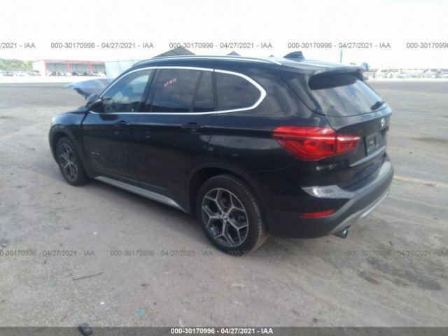 Photo 2 VIN: WBXHU7C37J5H42895 - BMW X1 