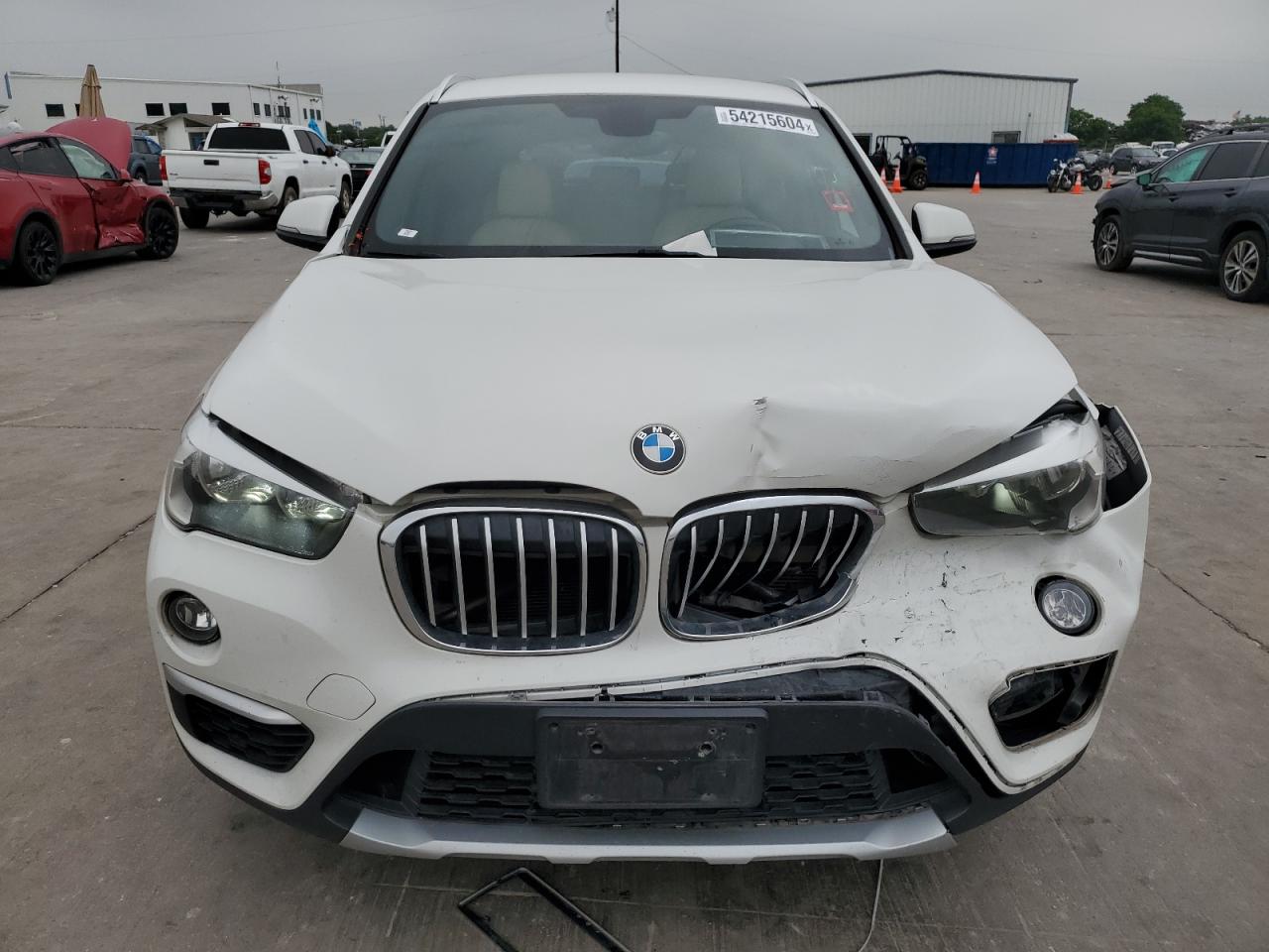 Photo 4 VIN: WBXHU7C37J5H44923 - BMW X1 