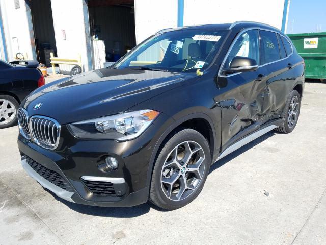 Photo 1 VIN: WBXHU7C37J5H44971 - BMW X1 SDRIVE2 