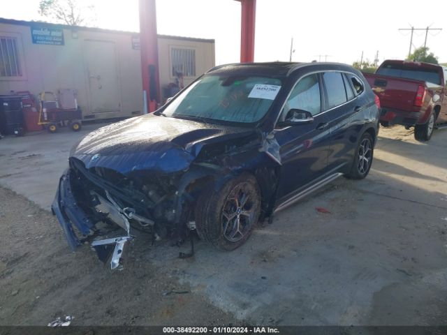 Photo 1 VIN: WBXHU7C37J5L06030 - BMW X1 