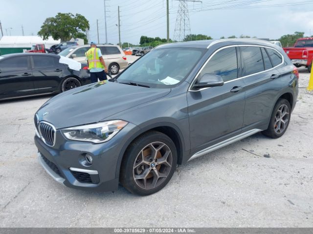 Photo 1 VIN: WBXHU7C37J5L08523 - BMW X1 