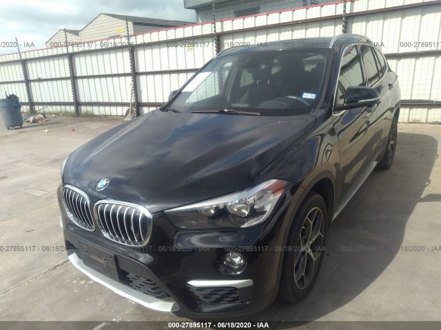 Photo 1 VIN: WBXHU7C37J5L09770 - BMW X1 