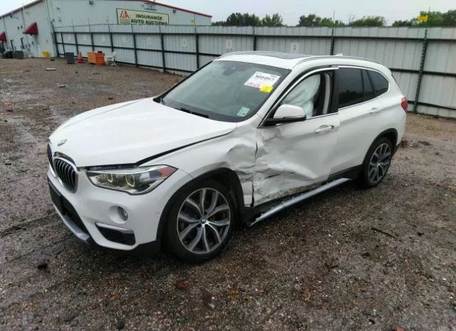 Photo 1 VIN: WBXHU7C38H5D71661 - BMW X1 