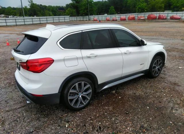 Photo 3 VIN: WBXHU7C38H5D71661 - BMW X1 