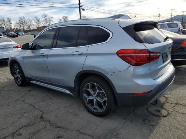 Photo 1 VIN: WBXHU7C38J5H38872 - BMW X1 