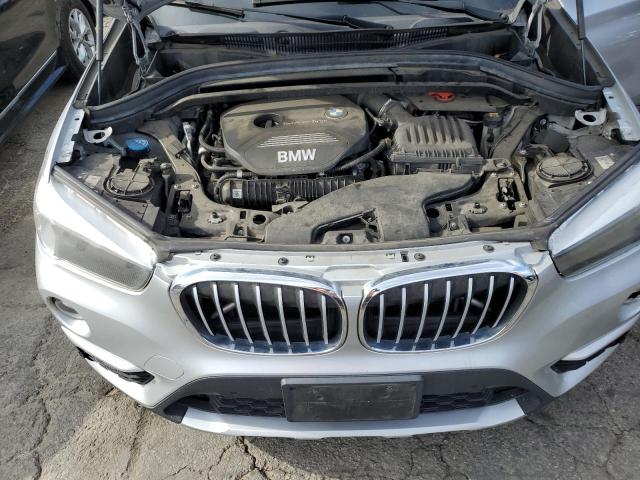 Photo 10 VIN: WBXHU7C38J5H38872 - BMW X1 