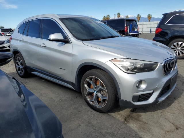 Photo 3 VIN: WBXHU7C38J5H38872 - BMW X1 