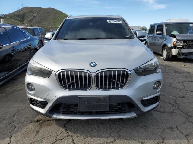 Photo 4 VIN: WBXHU7C38J5H38872 - BMW X1 