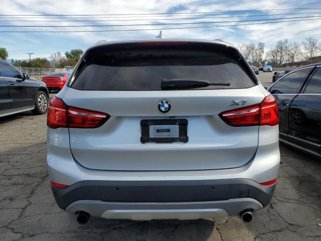 Photo 5 VIN: WBXHU7C38J5H38872 - BMW X1 