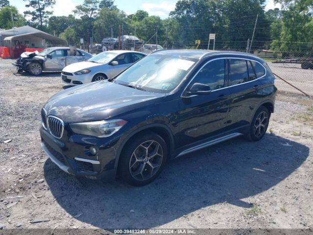 Photo 1 VIN: WBXHU7C38J5H40380 - BMW X1 