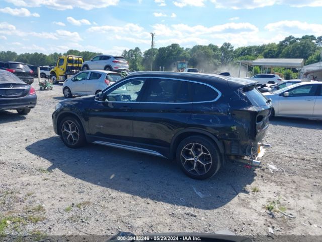 Photo 2 VIN: WBXHU7C38J5H40380 - BMW X1 