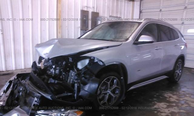 Photo 1 VIN: WBXHU7C38J5H41562 - BMW X1 