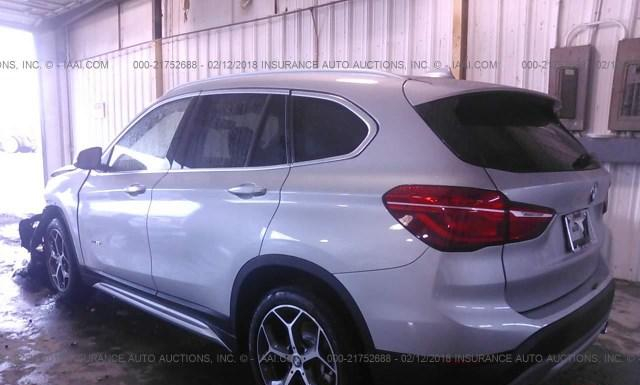 Photo 2 VIN: WBXHU7C38J5H41562 - BMW X1 