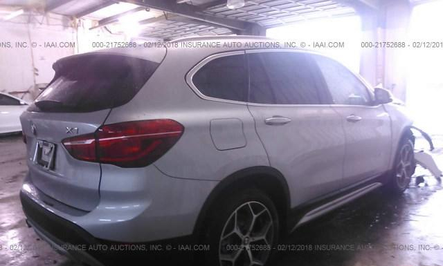 Photo 3 VIN: WBXHU7C38J5H41562 - BMW X1 