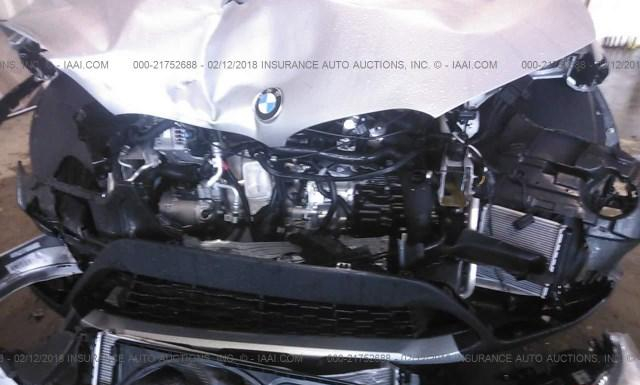 Photo 5 VIN: WBXHU7C38J5H41562 - BMW X1 