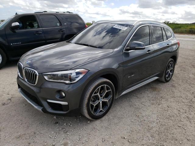 Photo 1 VIN: WBXHU7C38J5H42128 - BMW X1 