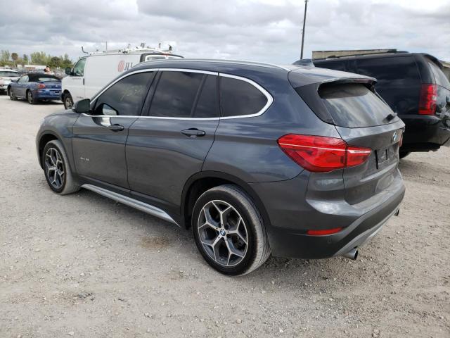 Photo 2 VIN: WBXHU7C38J5H42128 - BMW X1 