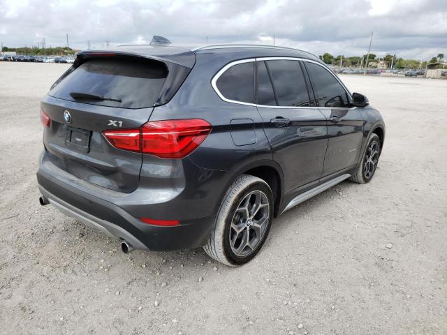 Photo 3 VIN: WBXHU7C38J5H42128 - BMW X1 