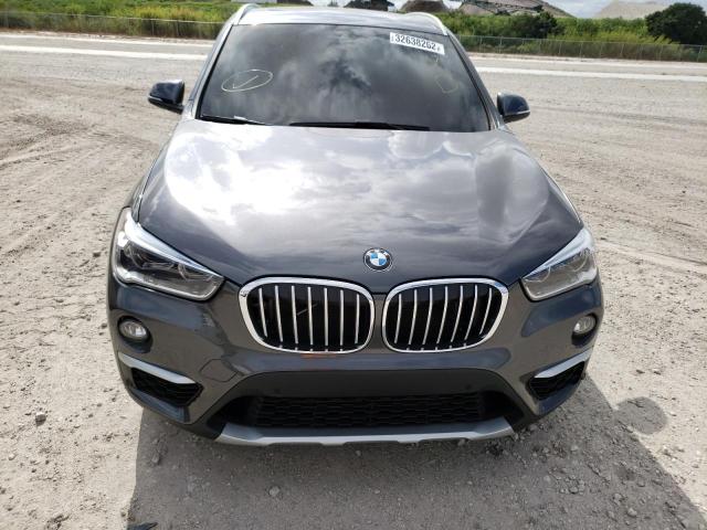 Photo 8 VIN: WBXHU7C38J5H42128 - BMW X1 