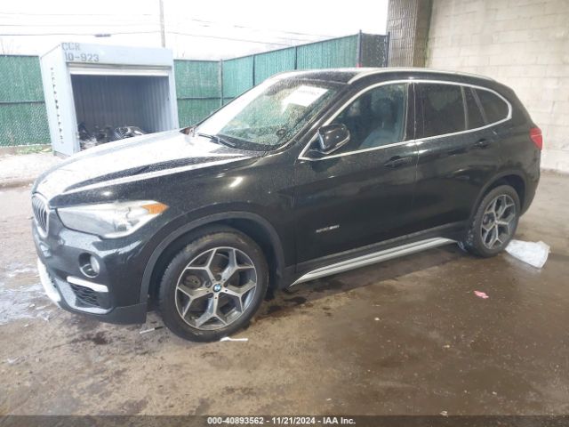 Photo 1 VIN: WBXHU7C38J5H42467 - BMW X1 