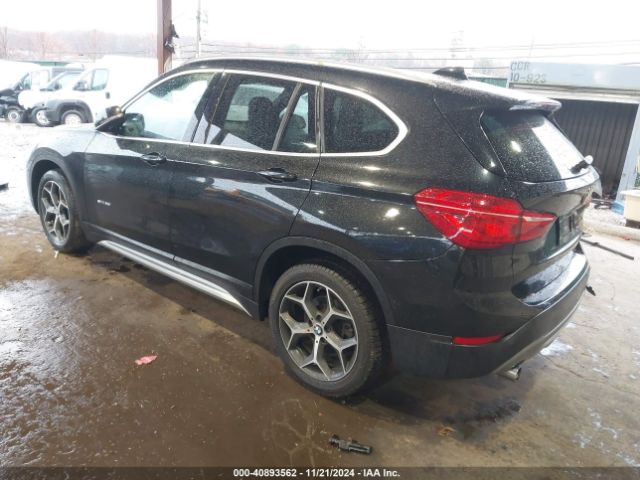 Photo 2 VIN: WBXHU7C38J5H42467 - BMW X1 