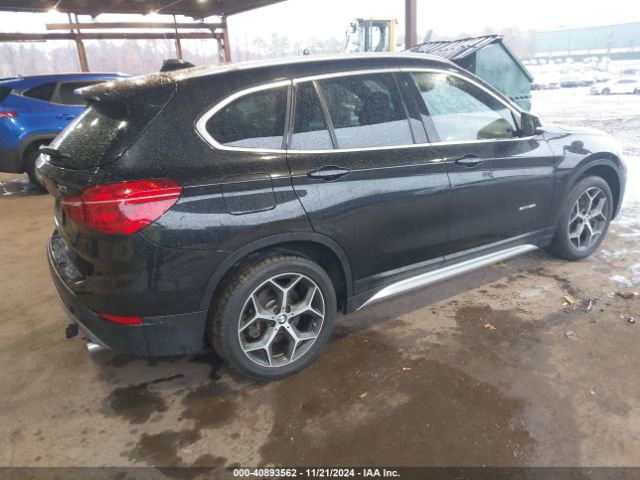 Photo 3 VIN: WBXHU7C38J5H42467 - BMW X1 