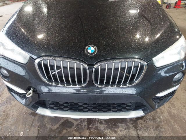 Photo 5 VIN: WBXHU7C38J5H42467 - BMW X1 