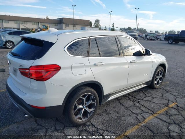 Photo 3 VIN: WBXHU7C38J5H45689 - BMW X1 