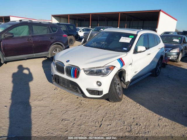 Photo 1 VIN: WBXHU7C38J5L05341 - BMW X1 