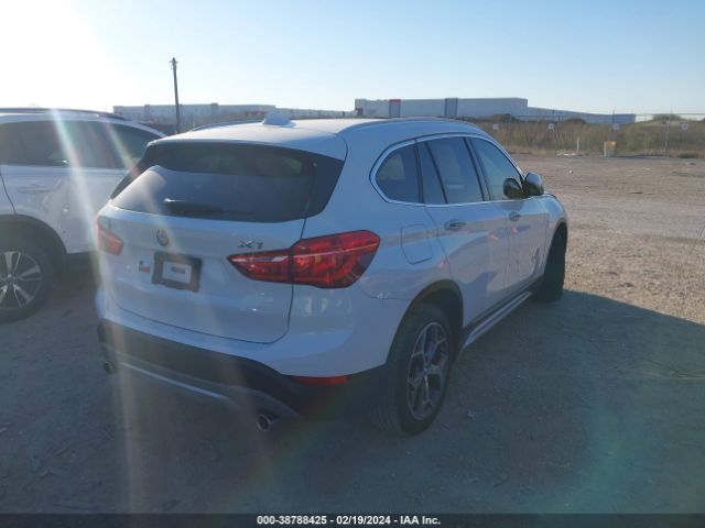 Photo 3 VIN: WBXHU7C38J5L05341 - BMW X1 