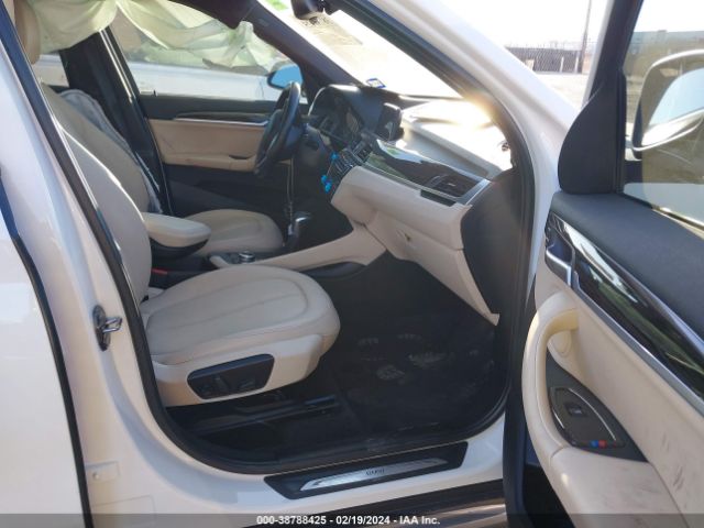 Photo 4 VIN: WBXHU7C38J5L05341 - BMW X1 