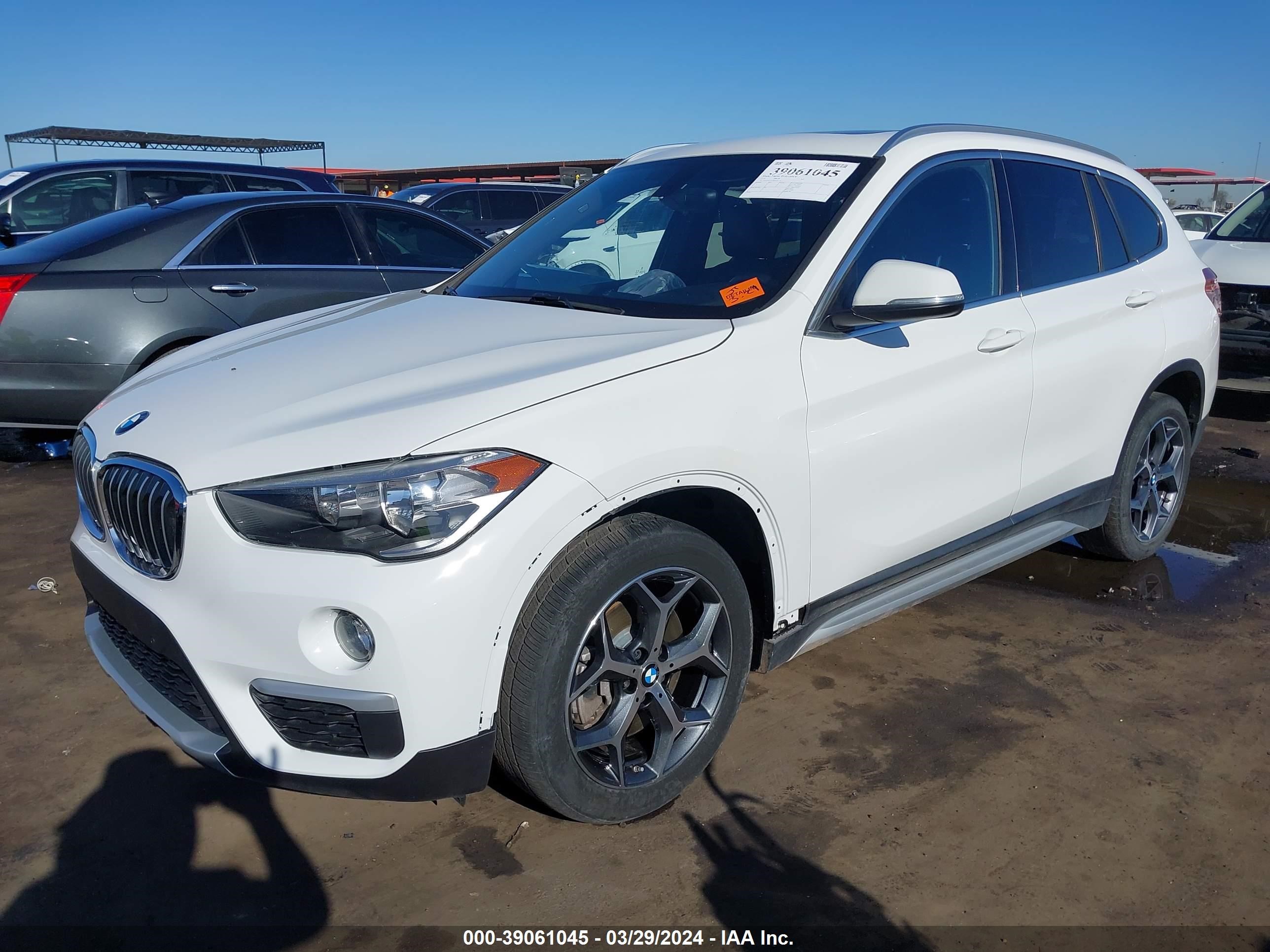 Photo 1 VIN: WBXHU7C38J5L06845 - BMW X1 