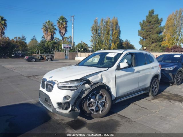 Photo 1 VIN: WBXHU7C38J5L08031 - BMW X1 