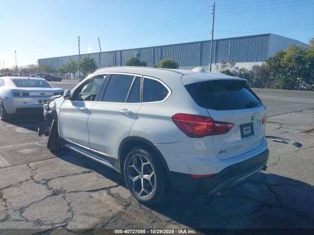 Photo 2 VIN: WBXHU7C38J5L08031 - BMW X1 