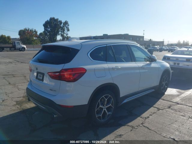 Photo 3 VIN: WBXHU7C38J5L08031 - BMW X1 