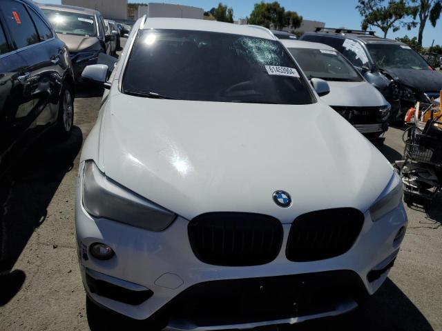 Photo 4 VIN: WBXHU7C38J5L09163 - BMW X1 