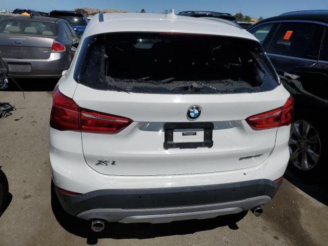 Photo 5 VIN: WBXHU7C38J5L09163 - BMW X1 