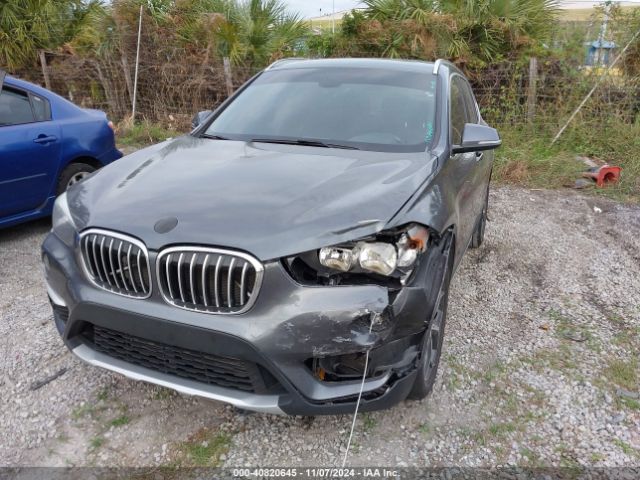 Photo 1 VIN: WBXHU7C38J5L09342 - BMW X1 