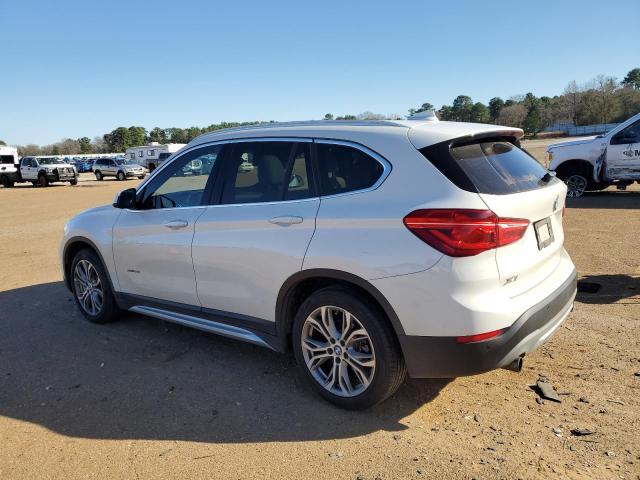 Photo 1 VIN: WBXHU7C39H5H32895 - BMW X1 