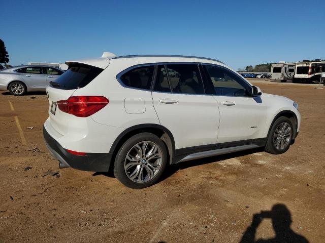 Photo 2 VIN: WBXHU7C39H5H32895 - BMW X1 