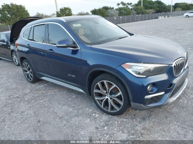 Photo 0 VIN: WBXHU7C39H5H33304 - BMW X1 