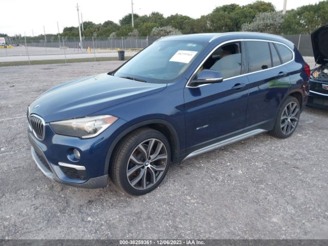 Photo 1 VIN: WBXHU7C39H5H33304 - BMW X1 