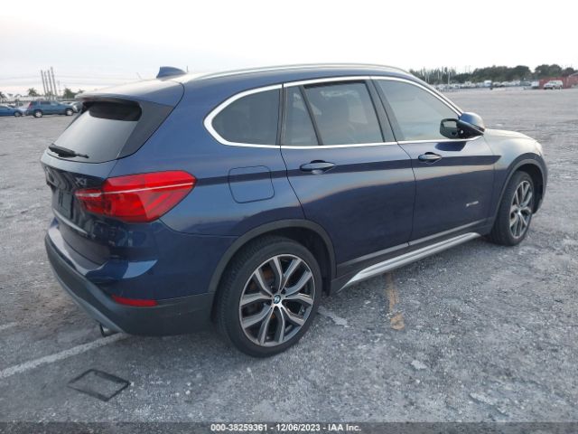 Photo 3 VIN: WBXHU7C39H5H33304 - BMW X1 